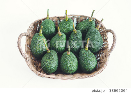 Avocado in a basket Avocado in natural light Avocado in a basket Avocado in natural light 58662064