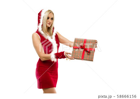 A beautiful sexy girl in a New Year's dress, hold 58666156