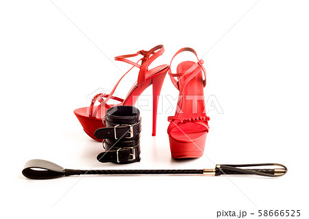 BDSM outfit for adult sex games. Red high-heeled BDSM outfit for adult sex games. Red high-heeled 58666525