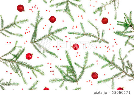 Christmas frame made of fir tree branches and red decoration on white background. Flat lay, top view Christmas frame made of fir tree branches and red decoration on white background. Flat lay, top view 58666571