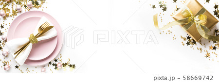 Christmas banner. Table setting with golden decor 58669742