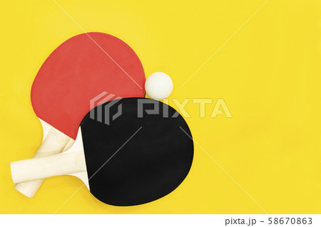 two ping pong table tennis rackets  58670863