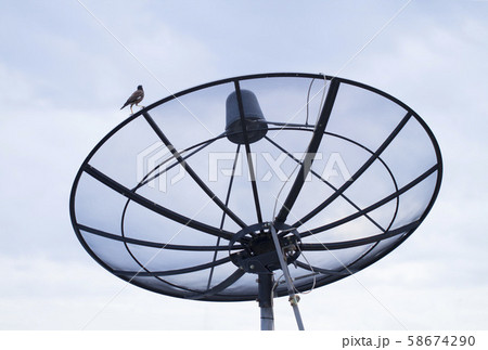 Satellite dish transmission data with blue sky 58674290