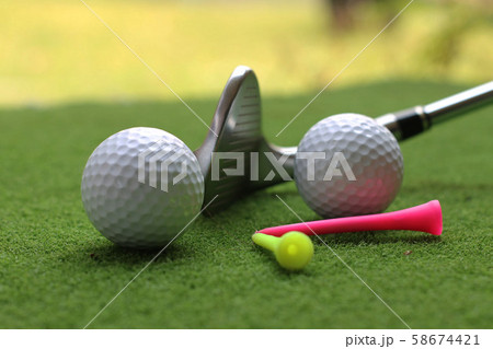 Golf equipment in beautiful golf course at sunset 58674421