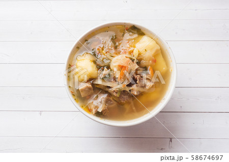 Soup of sauerkraut, meat stock in the dish. 58674697