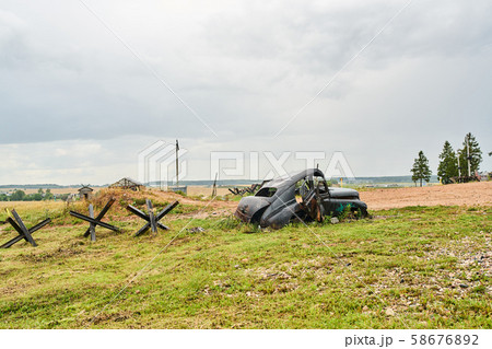 Old ruined USSR car on the battlefield. 58676892