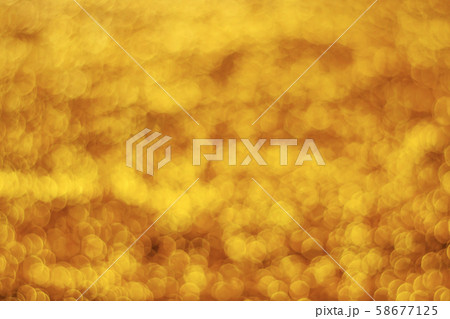 Abstract gold light bokeh christmas light blurred 58677125