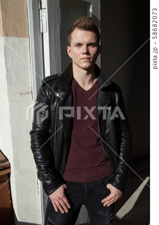 portrait of a fashionable man in a leather jacket portrait of a fashionable man in a leather jacket 58682073