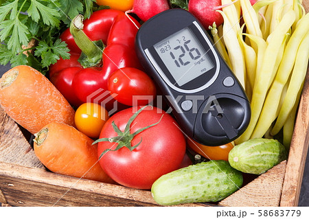 Glucose meter with result of sugar level, blood pressure monitor and fresh  fruits with vegetables, healthy lifestyle, diabetes and prevention of hyper  Stock Photo - Alamy