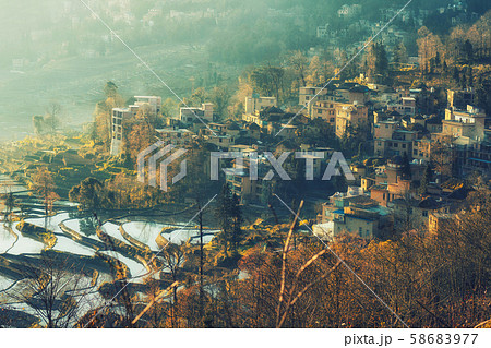 Small village and Terraced rice fields of YuanYang China in the morning 58683977