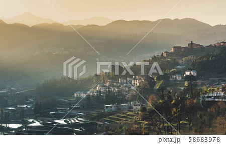 Small village and Terraced rice fields of YuanYang China in the morning 58683978