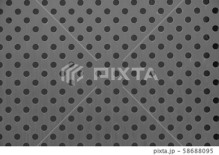 Top view of grey polka-dot metal surface Top view of grey polka-dot metal surface 58688095