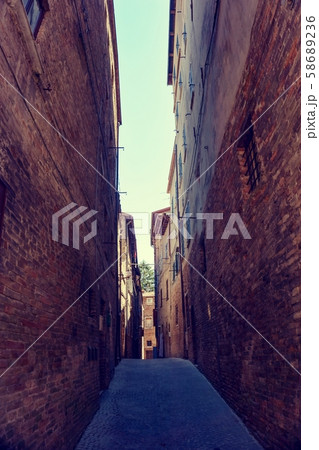 Narrow street in Urbino town in Italy Narrow street in Urbino town in Italy 58689236
