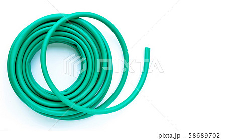 Green garden hose on white background. Green garden hose on white background. 58689702