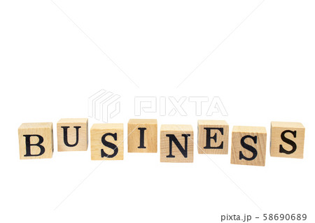 BUSINESS words on wooden block isolated on white background. 58690689
