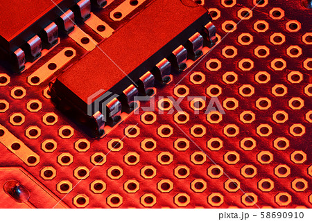 printed circuit board and microchip in red light printed circuit board and microchip in red light 58690910