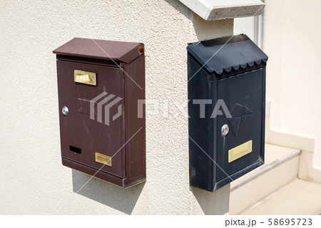 Old brown and black metallic retro post boxes Old brown and black metallic retro post boxes 58695723