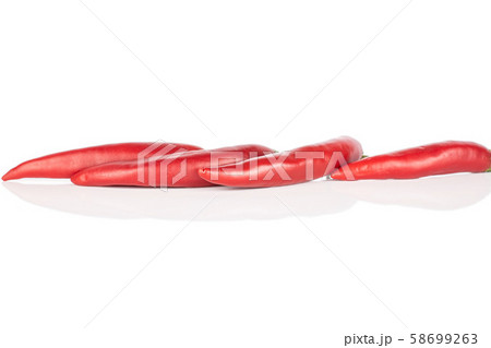 Red hot cayenne chili isolated on white Red hot cayenne chili isolated on white 58699263