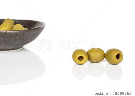 Green marinated olive isolated on white Green marinated olive isolated on white 58699266