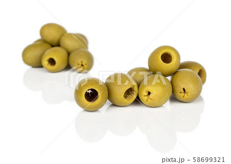 Green marinated olive isolated on white Green marinated olive isolated on white 58699321