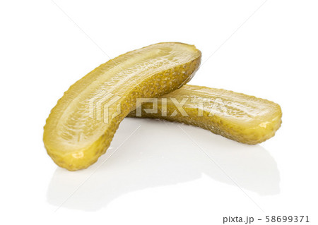 Sour green pickles isolated on white Sour green pickles isolated on white 58699371