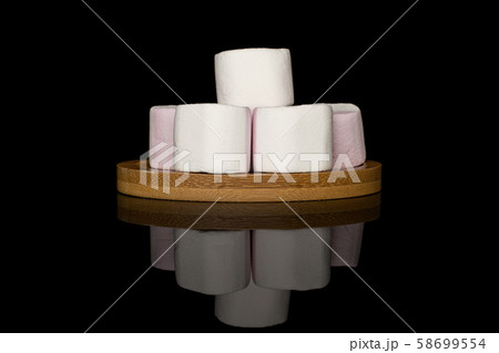 Sweet pastel marshmallow isolated on black glass 58699554