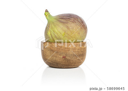 Sweet purple fig isolated on white Sweet purple fig isolated on white 58699645