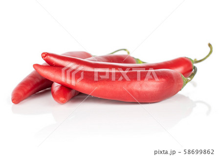 Red hot cayenne chili isolated on white Red hot cayenne chili isolated on white 58699862
