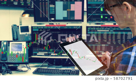 Double exposure of business woman using tablet Double exposure of business woman using tablet 58702791