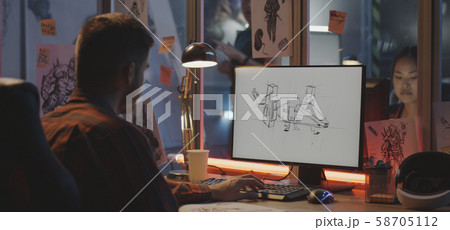 Graphic designer drawing video game art 58705112