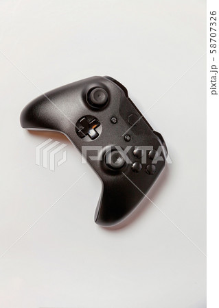 Black joystick on white background 58707326