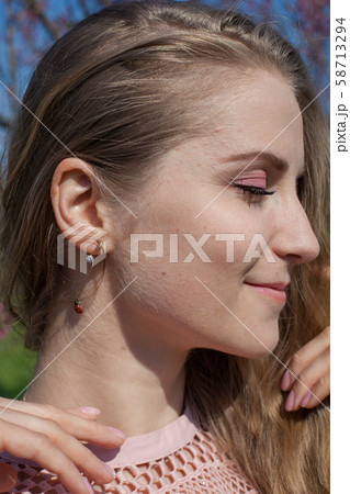 ladybug on a woman's neck Ladybird insects 58713294
