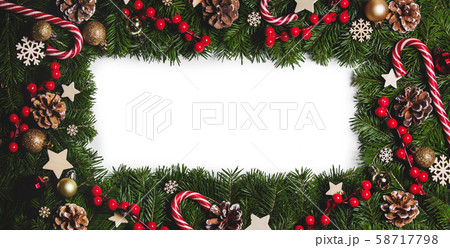 Christmas frame of tree branches Christmas frame of tree branches 58717798