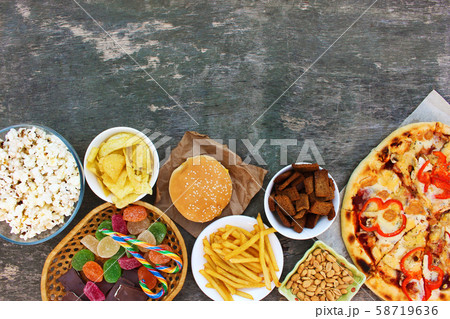 Fast food on old wooden background. Concept of Fast food on old wooden background. Concept of 58719636