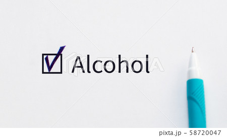 Alcohol - checkbox with a tick on white paper with blue pen. Checklist concept. I agree and vote for this, this is my choice. Alcohol - checkbox with a tick on white paper with blue pen. Checklist concept. I agree and vote for this, this is my choice. 58720047