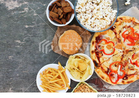 Fast food on old wooden background. Concept of Fast food on old wooden background. Concept of 58720823