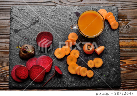 Top view at vegetable background of beets carrots 58722647