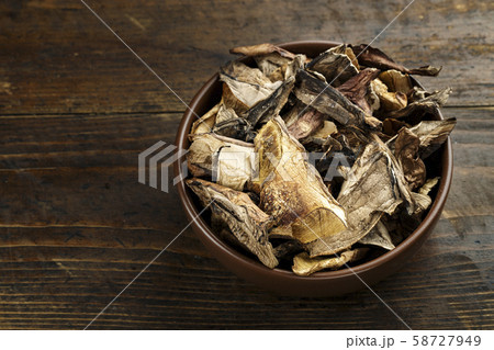 dry mushrooms in a plate 58727949