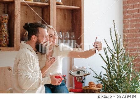 family morning leisure couple kitchen selfie 58729484