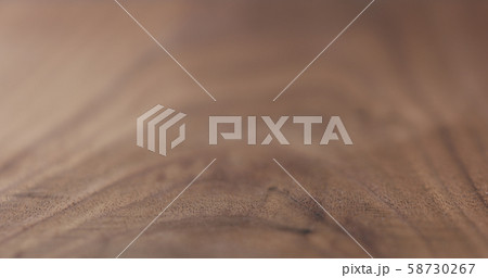 closeup of oil finished black walnut wood surface 58730267