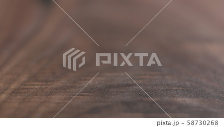closeup of oil finished black walnut wood surface 58730268