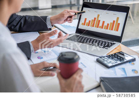 Business team consultant working with new startup Business team consultant working with new startup 58730585