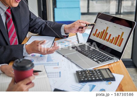 Two business team discussing and planning strategy Two business team discussing and planning strategy 58730586