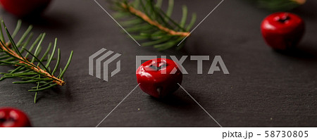 Christmas decorations closeup on black background Christmas decorations closeup on black background 58730805