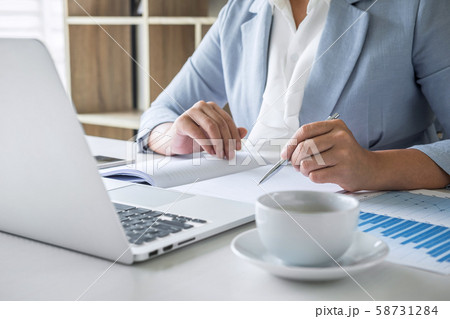 Business woman accountant financier working audit 58731284