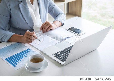 Business woman accountant financier working audit Business woman accountant financier working audit 58731285