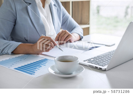 Business woman accountant financier working audit 58731286