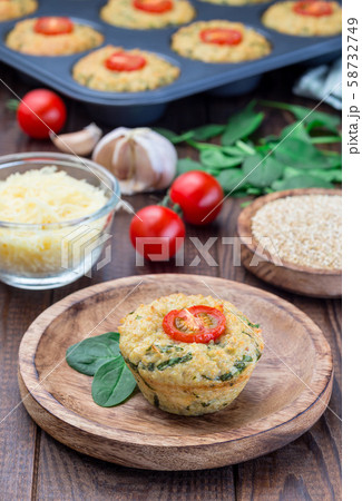 Savory muffins with quinoa, cheese and spinach 58732749