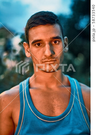 Man portrait looking at the camera Man portrait looking at the camera 58733540