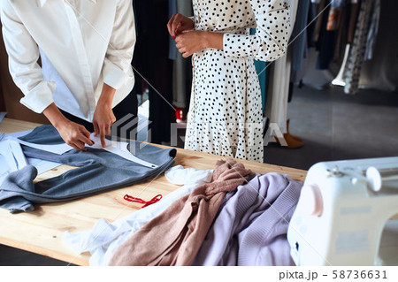 Closeup of young female working at designer studio 58736631
